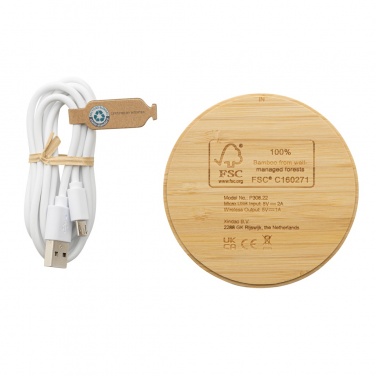 Logotrade werbemittel das Foto: Rundes kabelloses 5W-Ladegerät aus Bambus